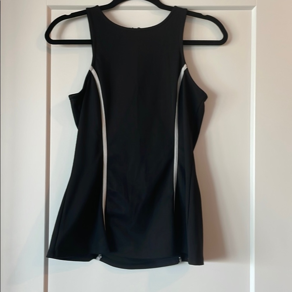 Black tank top; fits tight to body size M